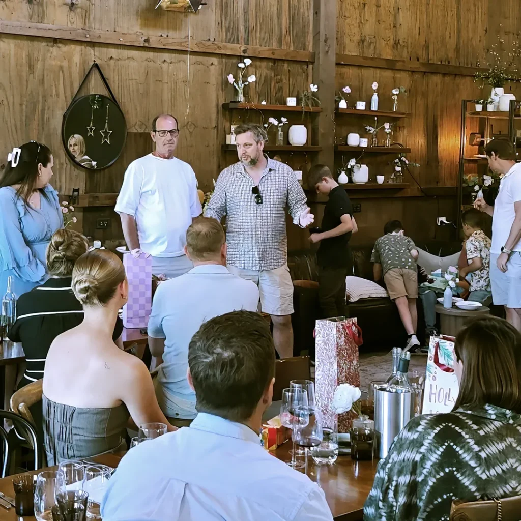 Dane Hocking making a speech during a staff gathering
